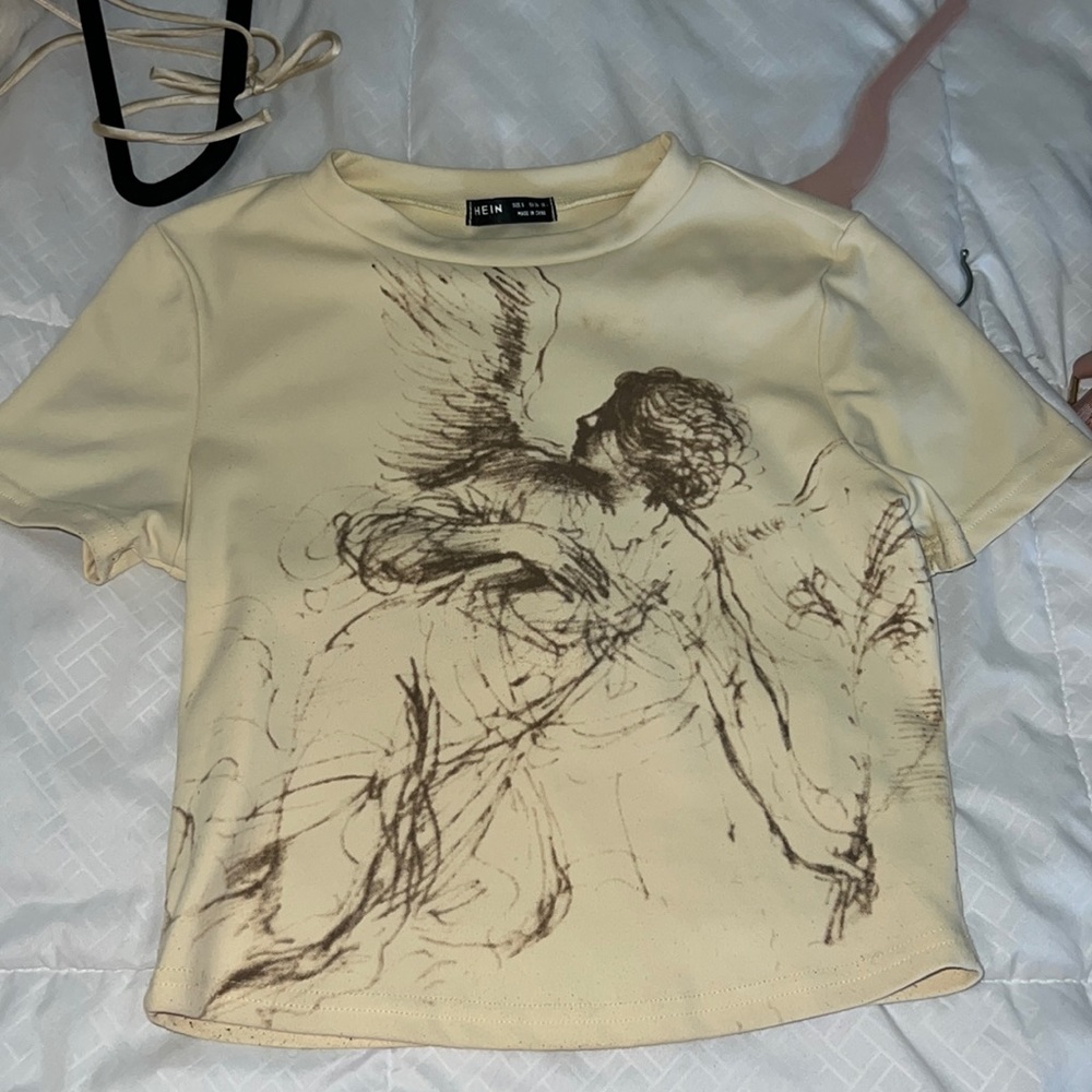 Small Semi-Cropped cream colored graphic tee. Shein.
